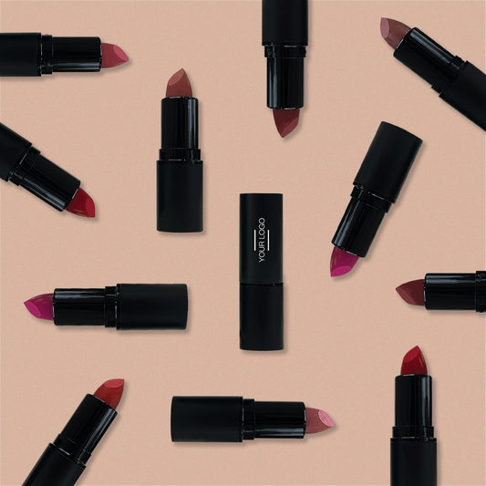 Flat lay of customizable lipsticks in various shades arranged in a pattern, perfect for promoting beauty brands and encouraging product reviews