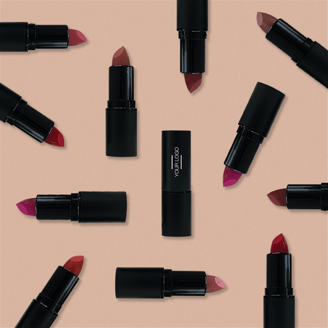 Flat lay of customizable lipsticks in various shades arranged in a pattern, perfect for promoting beauty brands and encouraging product reviews