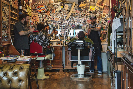 Lively barbershop scene with barbers and clients in a vintage-inspired setting, showcasing the charm and potential of building a thriving, sustainable barbershop business