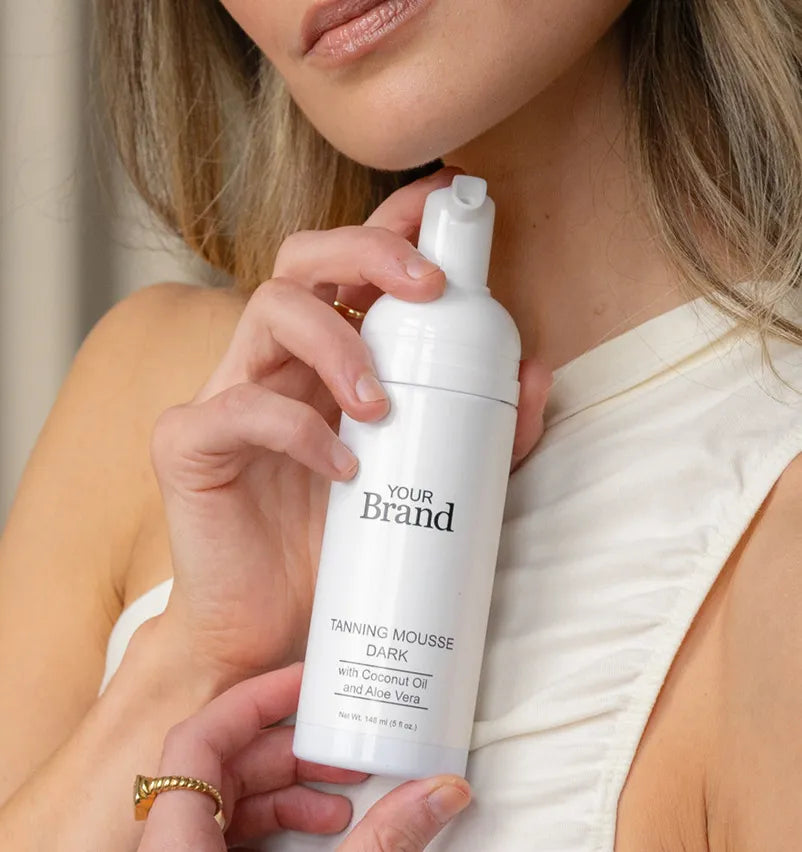 Blanka hero private label beauty Female holding tanning mousse