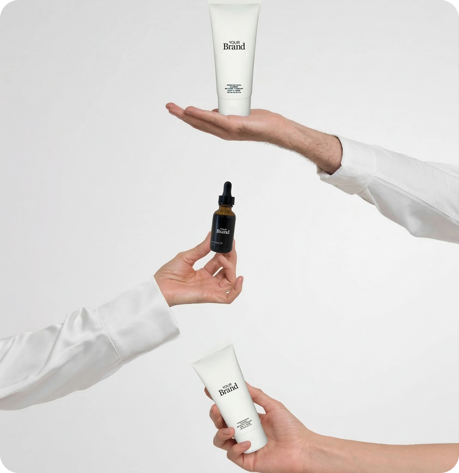 Chemists holding three products branded with Your Brand