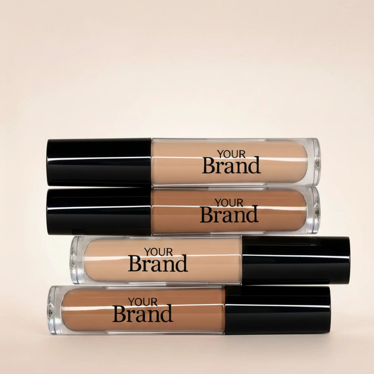 Four concealer bottles with 'Your Brand' text on a beige background