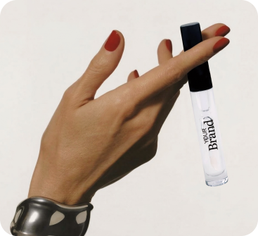 Hand holding a lip gloss with 'Your Brand' text on a white background