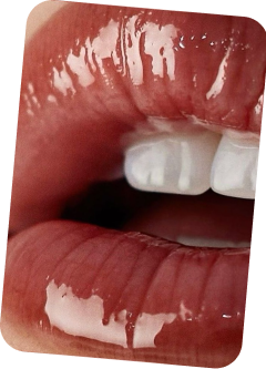 Close-up of a person's mouth with visible teeth.