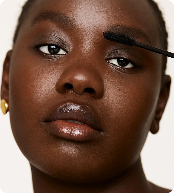 Professional black mascara wand with custom white label packaging for lash artists