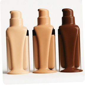 Collection of custom branded foundation in nude shades with premium packaging