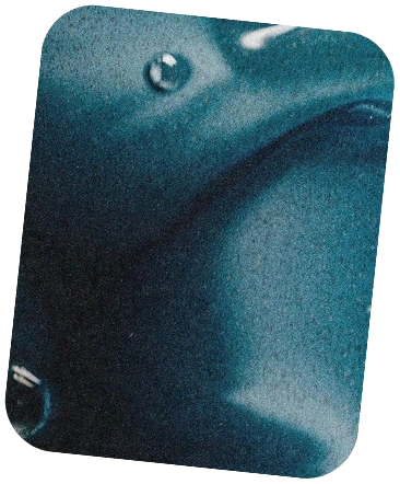 Teal-colored object with a glossy finish